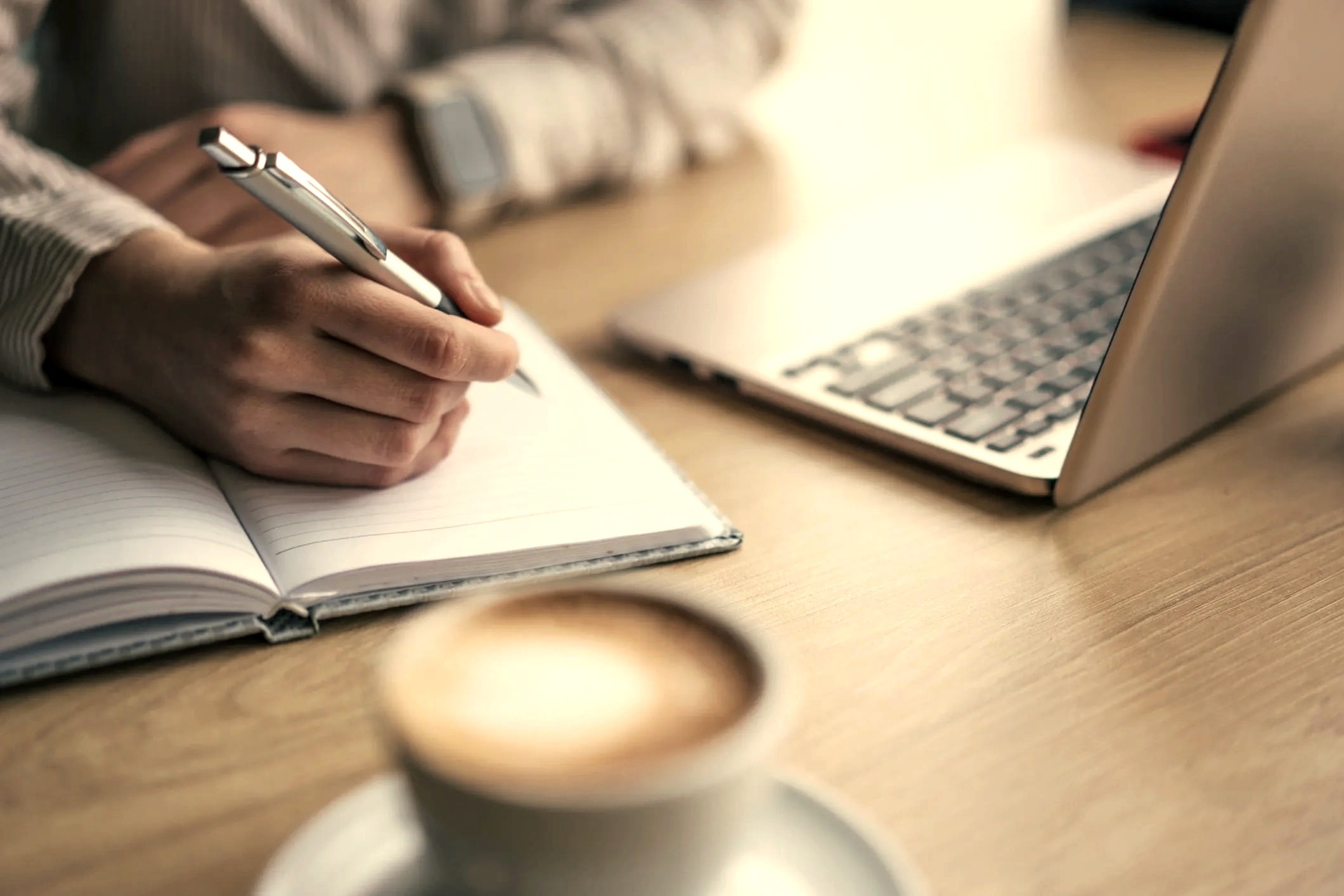 Woman thoughtfully reviewing financial documents